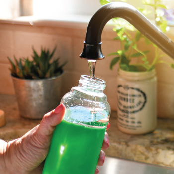 Filling up reusable water bottle