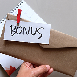 An envelope containing an employee bonus as part of an employee incentives program.